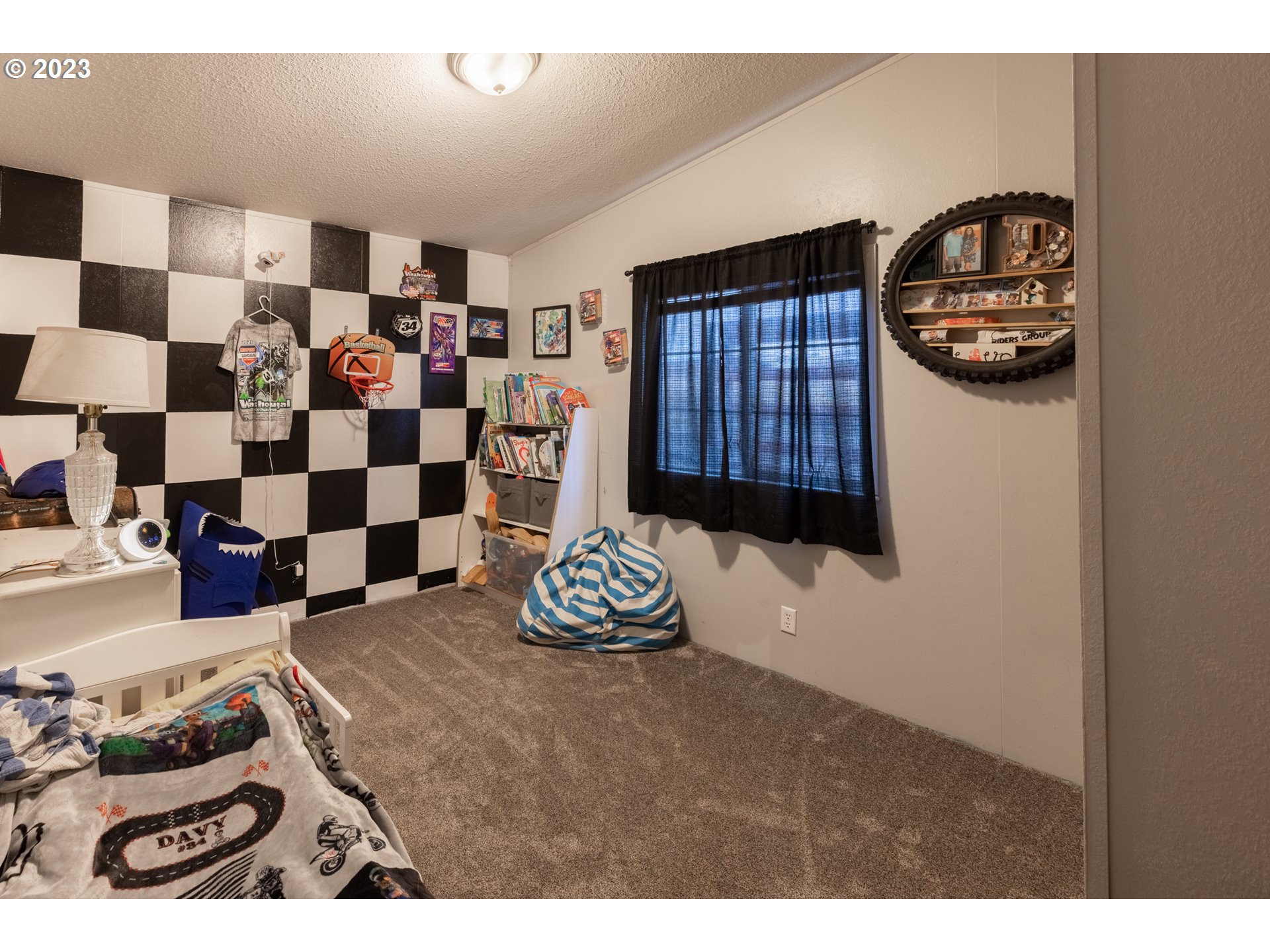 78390 Agnew Road Hermiston, OR 97838 - Photo 22 of 27 a hallway with a soccer and a table
