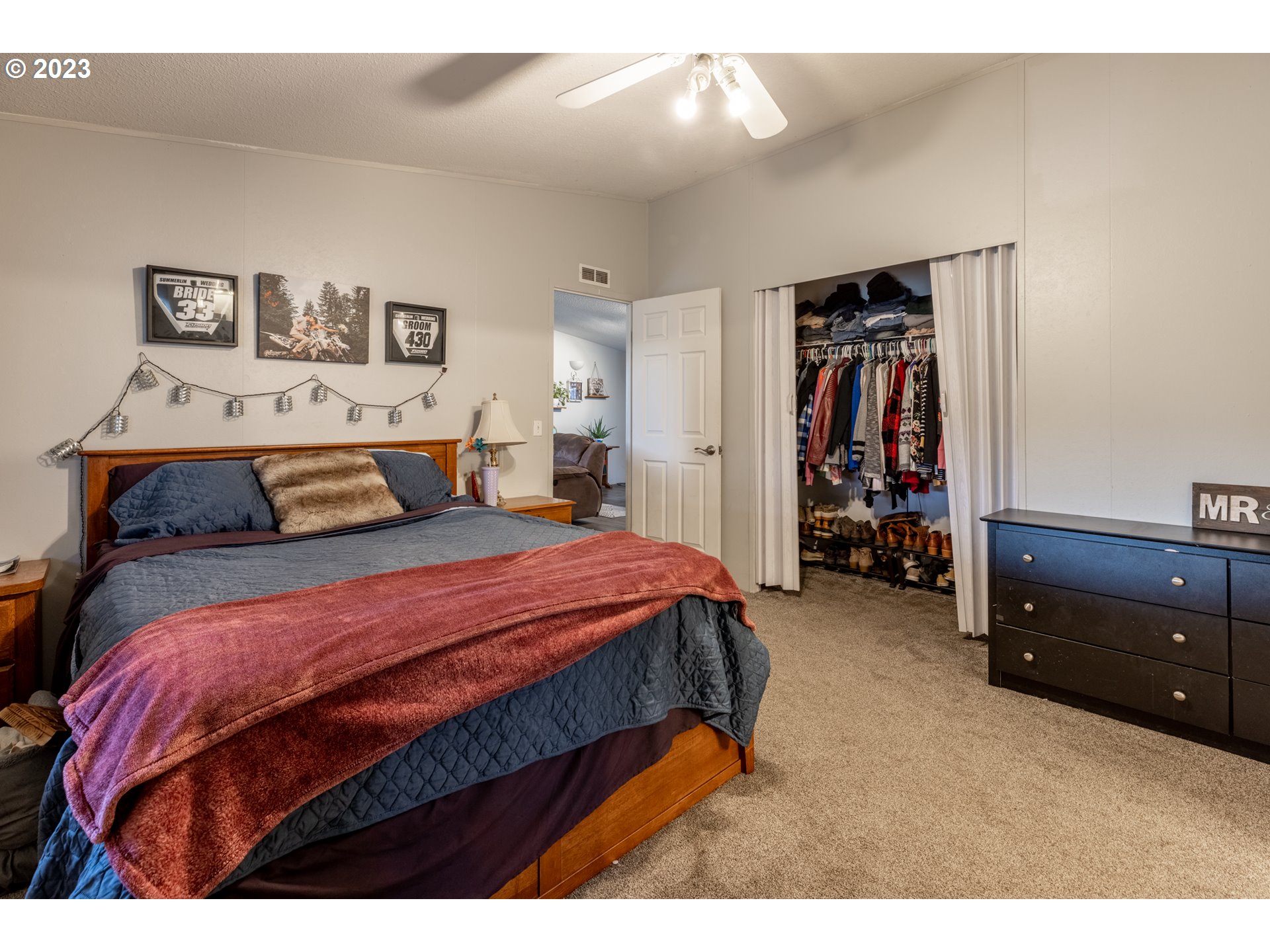 78390 Agnew Road Hermiston, OR 97838 - Photo 25 of 27 a bedroom with a bed and a night stand