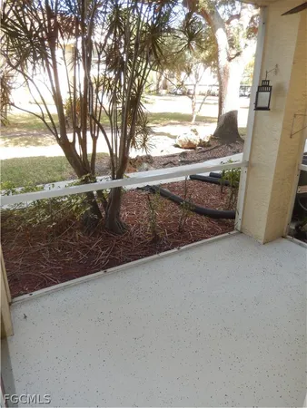 a view of a backyard of the house