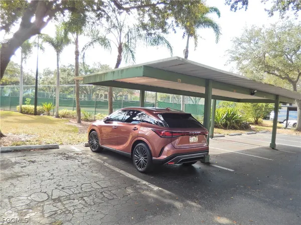 a view of a swimming pool with chairs