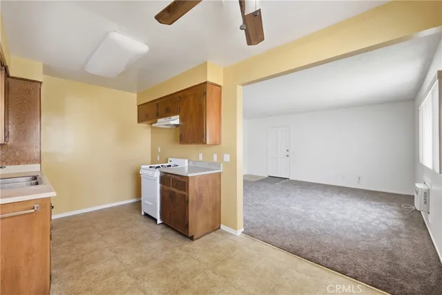 a view of a storage & utility room with a sink