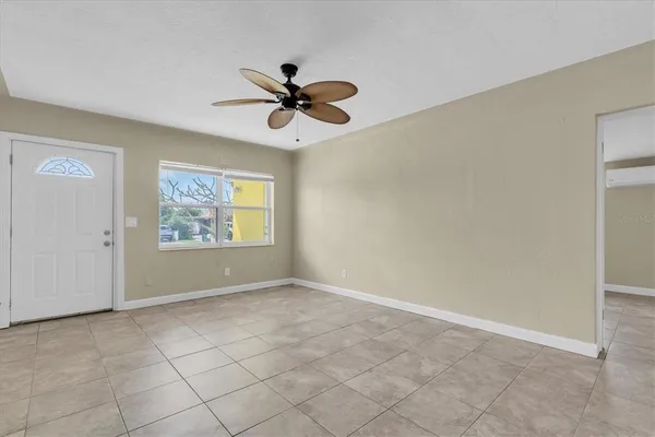 a kitchen with a cabinets and window