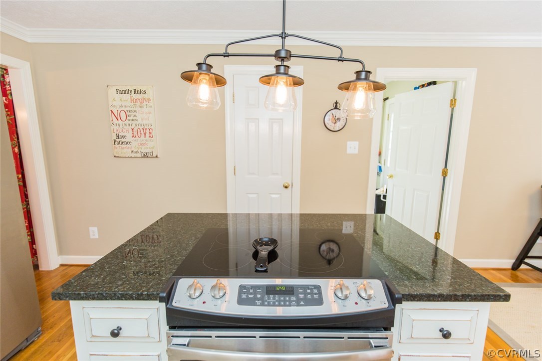 7157 Hughes Road Sandston, VA 23150 - Photo 31 of 47 Kitchen. Island from the side with the stove. Smoo