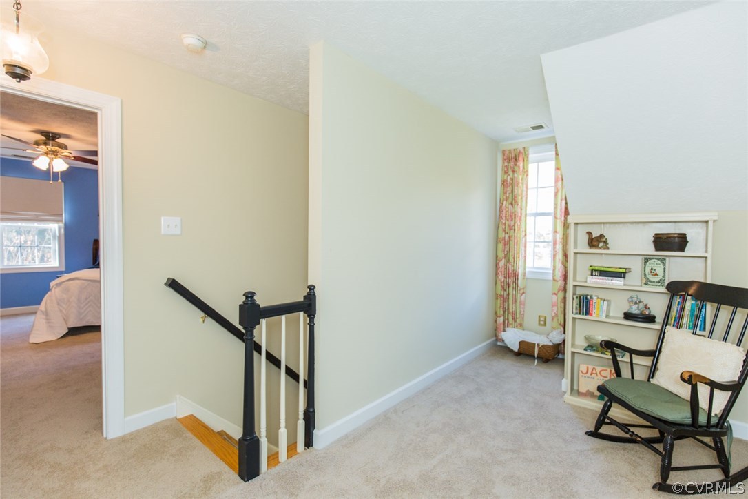 7157 Hughes Road Sandston, VA 23150 - Photo 34 of 47 Upstairs. Second Level. Stairs open to a large are
