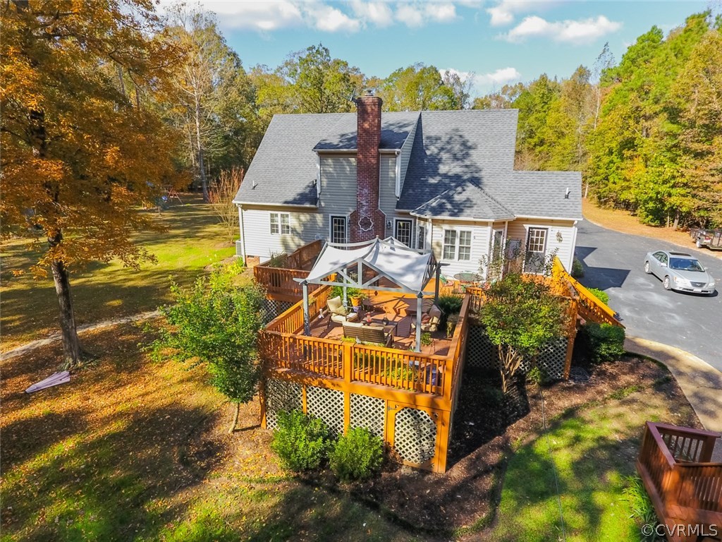 7157 Hughes Road Sandston, VA 23150 - Photo 46 of 47 Backyard, showing back of the home and that wonder
