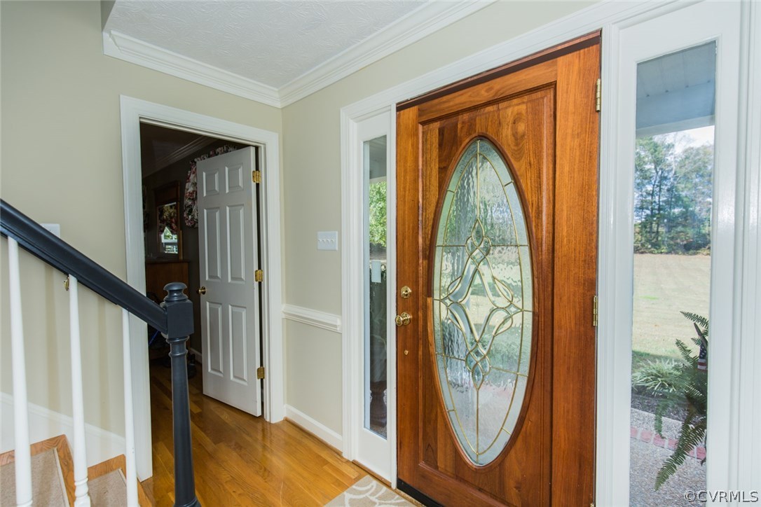 7157 Hughes Road Sandston, VA 23150 - Photo 6 of 47 Open Foyer with neutral, warm tones and beautiful