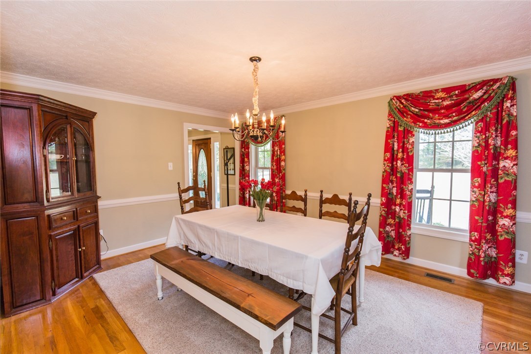 7157 Hughes Road Sandston, VA 23150 - Photo 7 of 47 Formal Dining Room with accent wood trim, Chair Ra