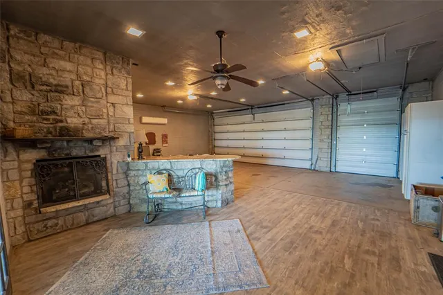 a view of a livingroom with furniture and staircase
