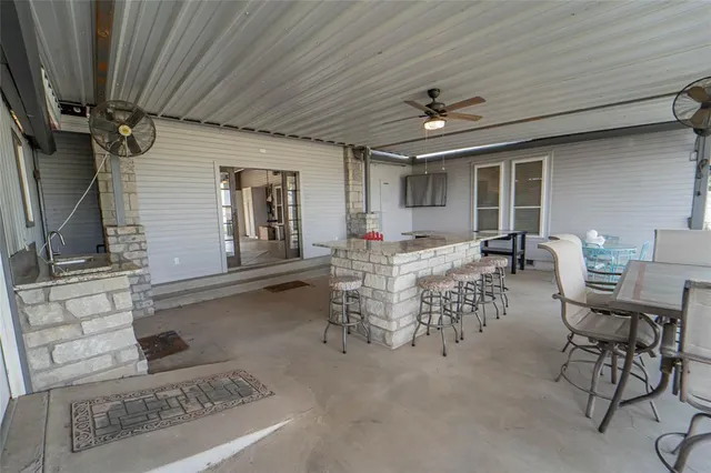 a outdoor space with lots of table and chairs