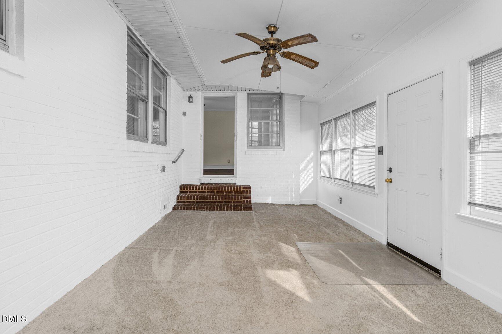 902 Treemont Road Northwest Wilson, NC 27896 - Photo 36 of 43 a view of a livingroom with a ceiling fan and window