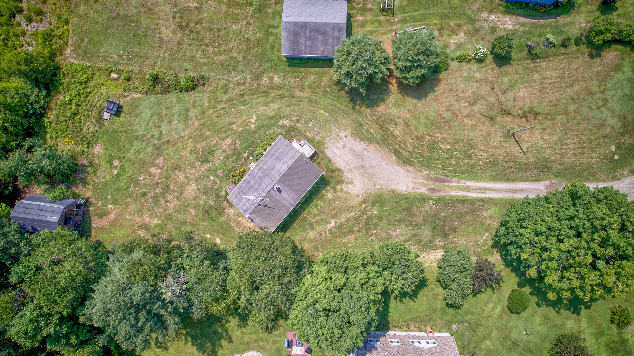 275 Pea Ridge Road Lincoln, ME 04457 - Photo 4 of 25 dji_fly_20240714_112636_563_172098051779