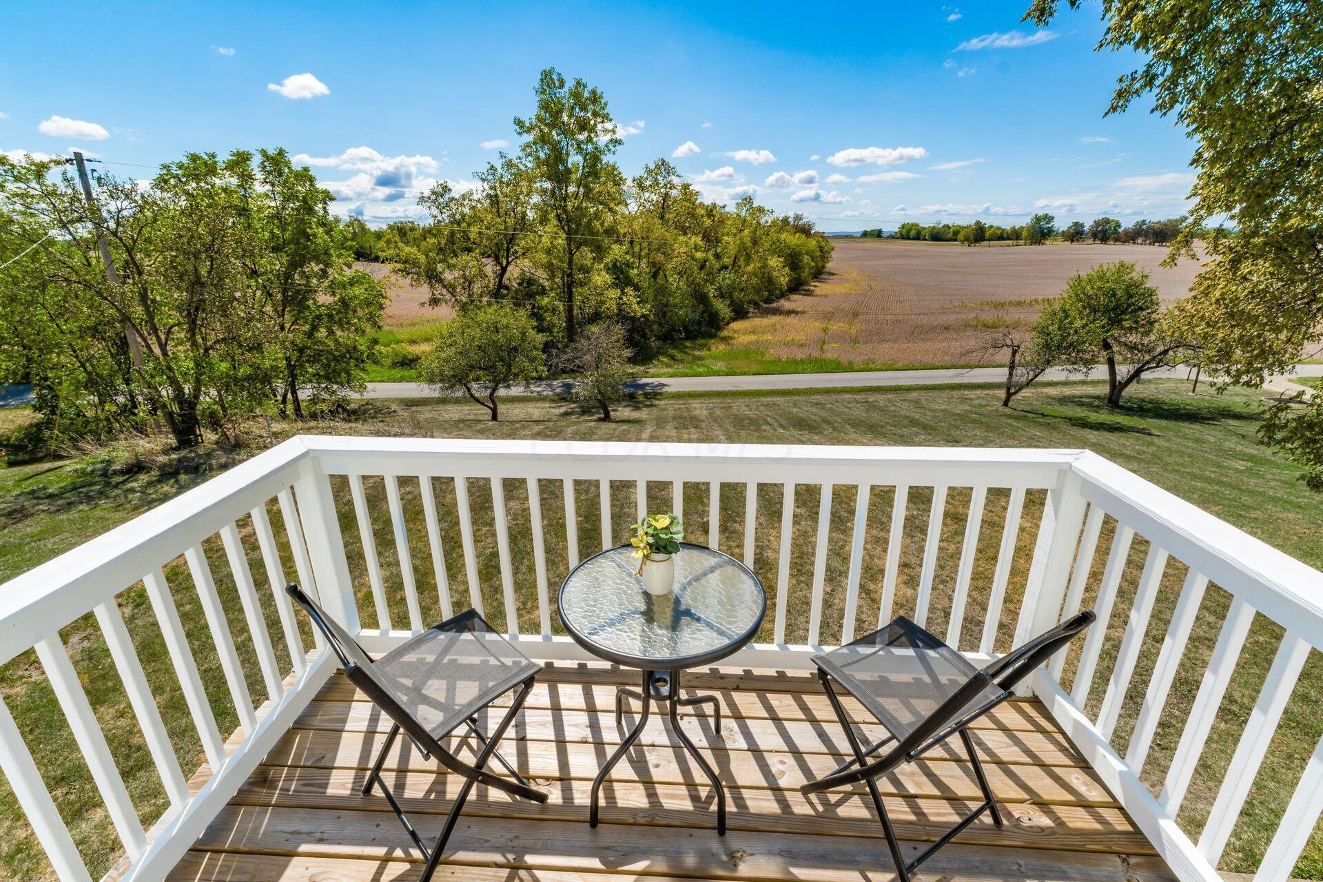 10240 Valentine Road Southwest Stoutsville, OH 43154 - Photo 44 of 60 Porch from second floor overlooking pasture and nature.
