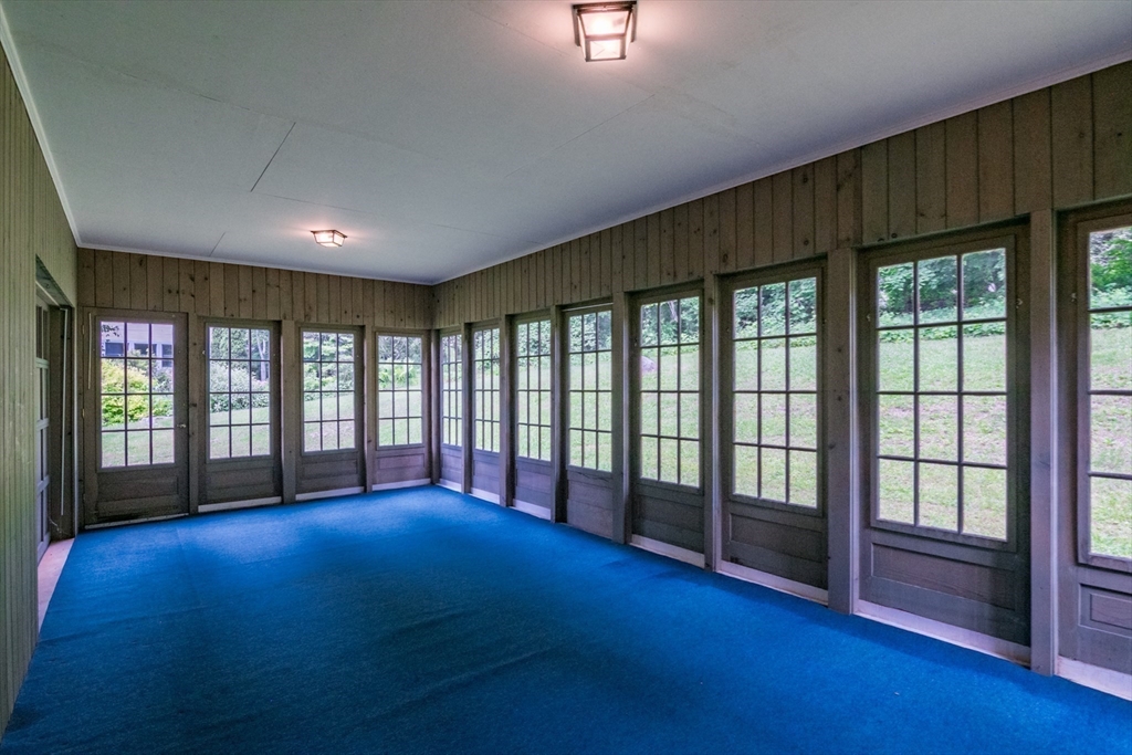 24 South Sunset Avenue Amherst, MA 01002 - Photo 18 of 42 a view of an empty room with glass door