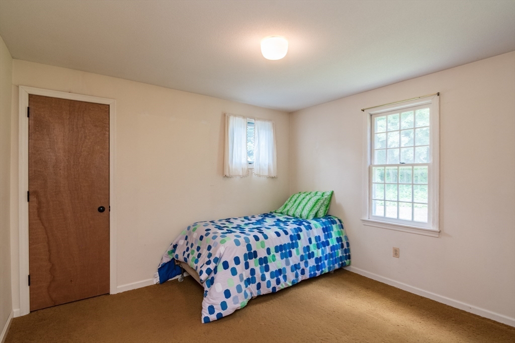 24 South Sunset Avenue Amherst, MA 01002 - Photo 31 of 42 a bedroom with a bed and a window