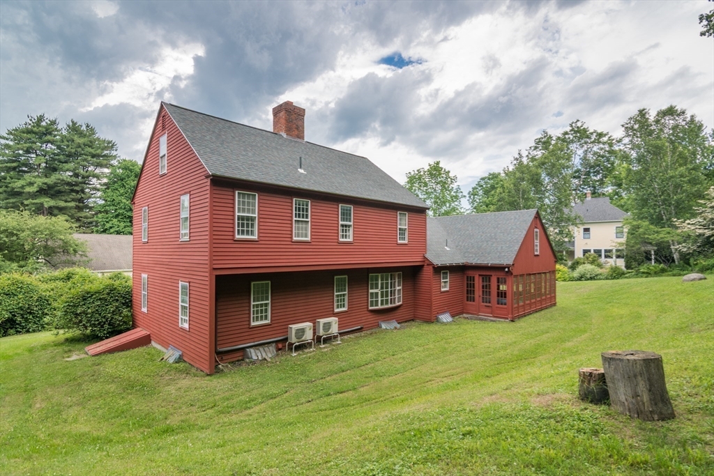 24 South Sunset Avenue Amherst, MA 01002 - Photo 35 of 42 a front view of a house with garden