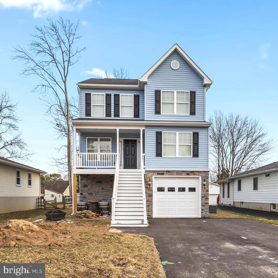 13107 Choptank Road Middle River, MD 21220 - Photo 1 of 42 a front view of a house with a yard