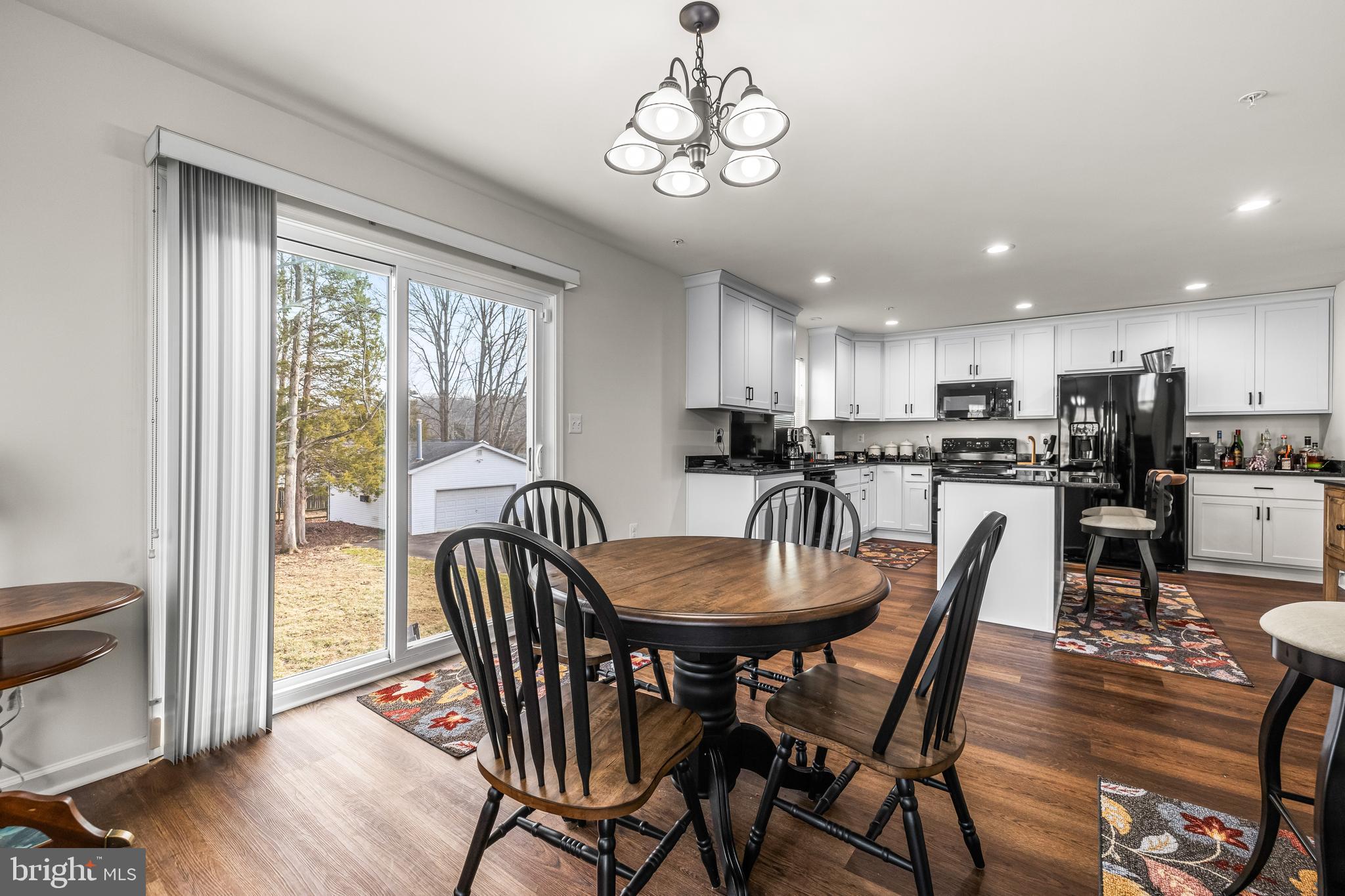 13107 Choptank Road Middle River, MD 21220 - Photo 20 of 42 a view of a dining room with furniture window and wooden floor