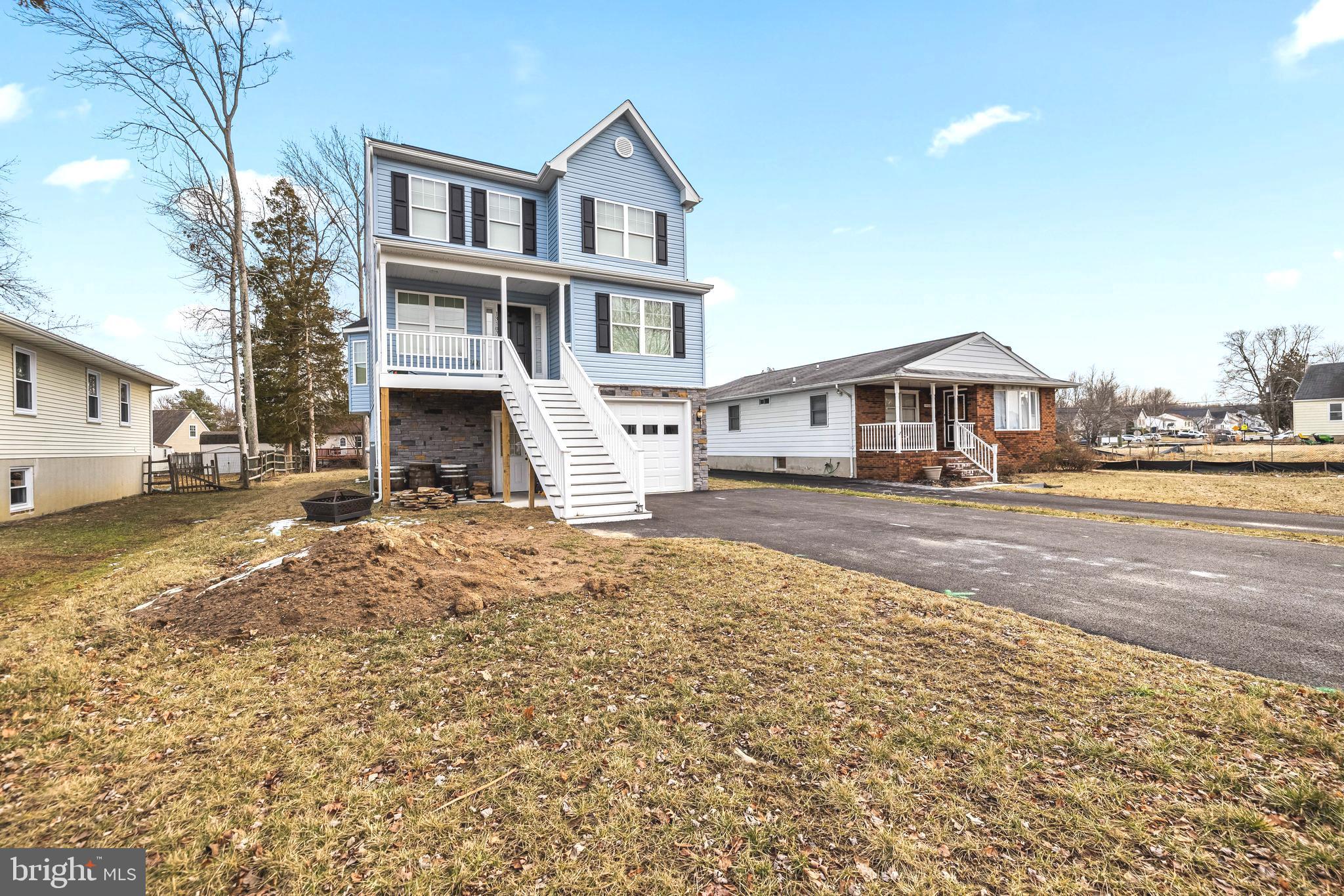 13107 Choptank Road Middle River, MD 21220 - Photo 2 of 42 a front view of a house with a yard