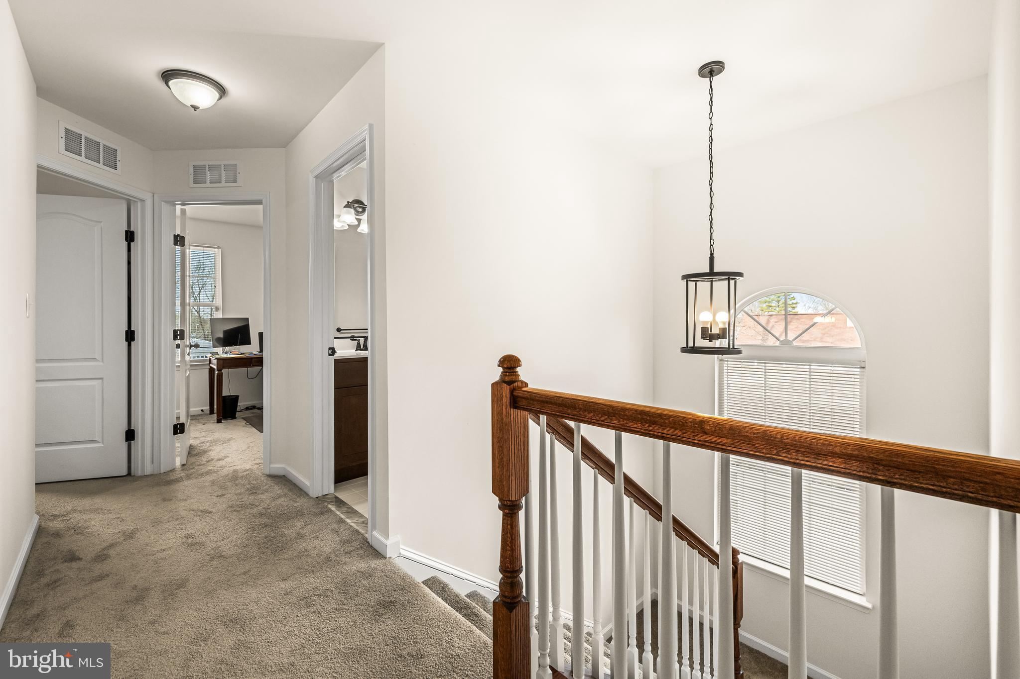 13107 Choptank Road Middle River, MD 21220 - Photo 21 of 42 a view of a hallway with windows