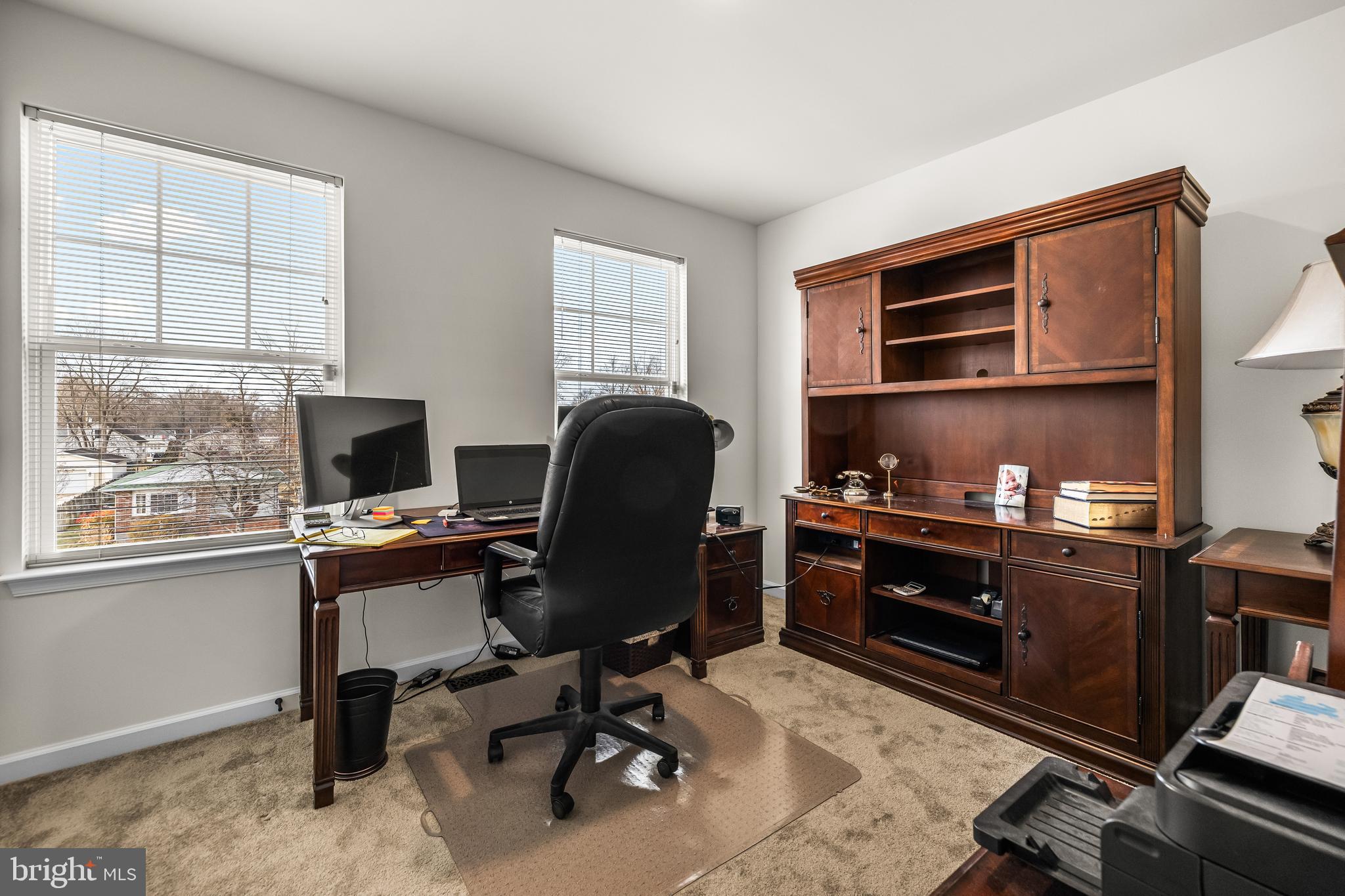 13107 Choptank Road Middle River, MD 21220 - Photo 27 of 42 a view of a workspace with furniture and a window