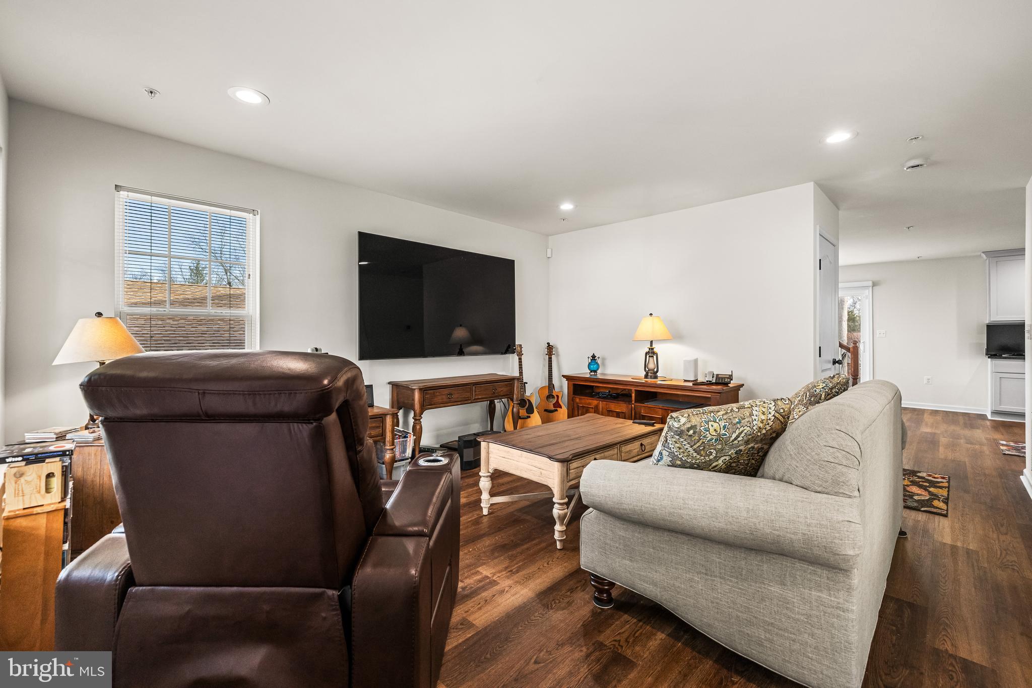 13107 Choptank Road Middle River, MD 21220 - Photo 4 of 42 a living room with furniture and a flat screen tv