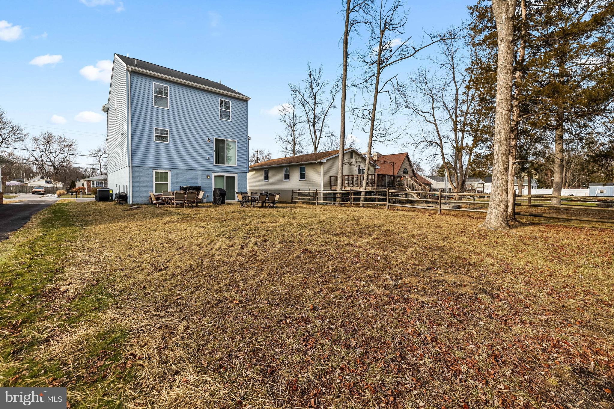 13107 Choptank Road Middle River, MD 21220 - Photo 41 of 42 a large building with trees in front of it