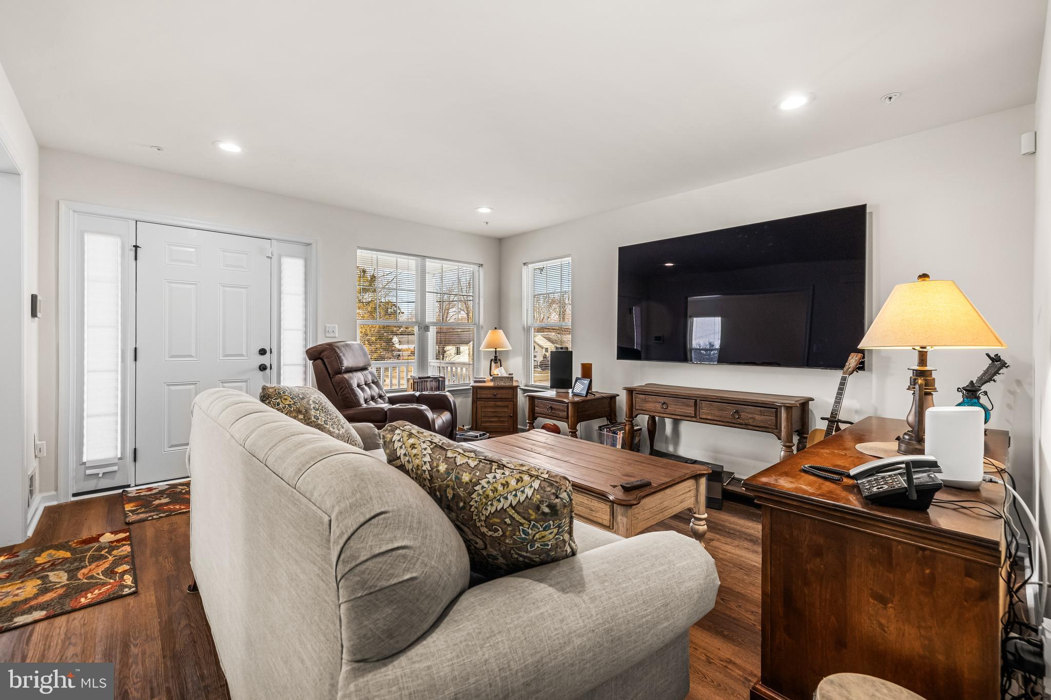 13107 Choptank Road Middle River, MD 21220 - Photo 5 of 42 a living room with furniture and a flat screen tv