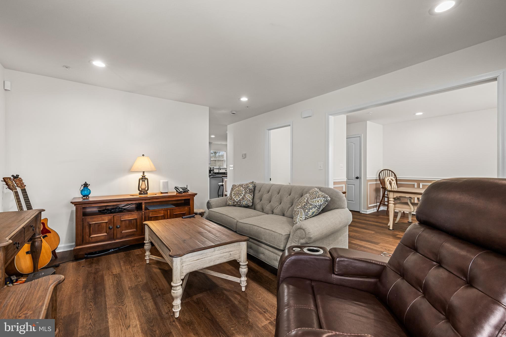 13107 Choptank Road Middle River, MD 21220 - Photo 7 of 42 a living room with furniture and a wooden floor