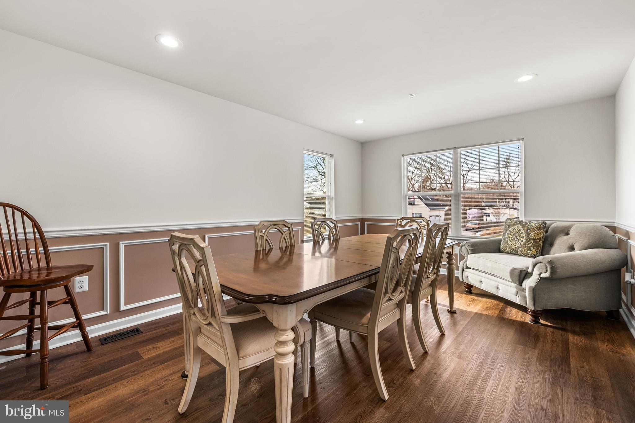 13107 Choptank Road Middle River, MD 21220 - Photo 9 of 42 a view of a dining room with furniture window and wooden floor