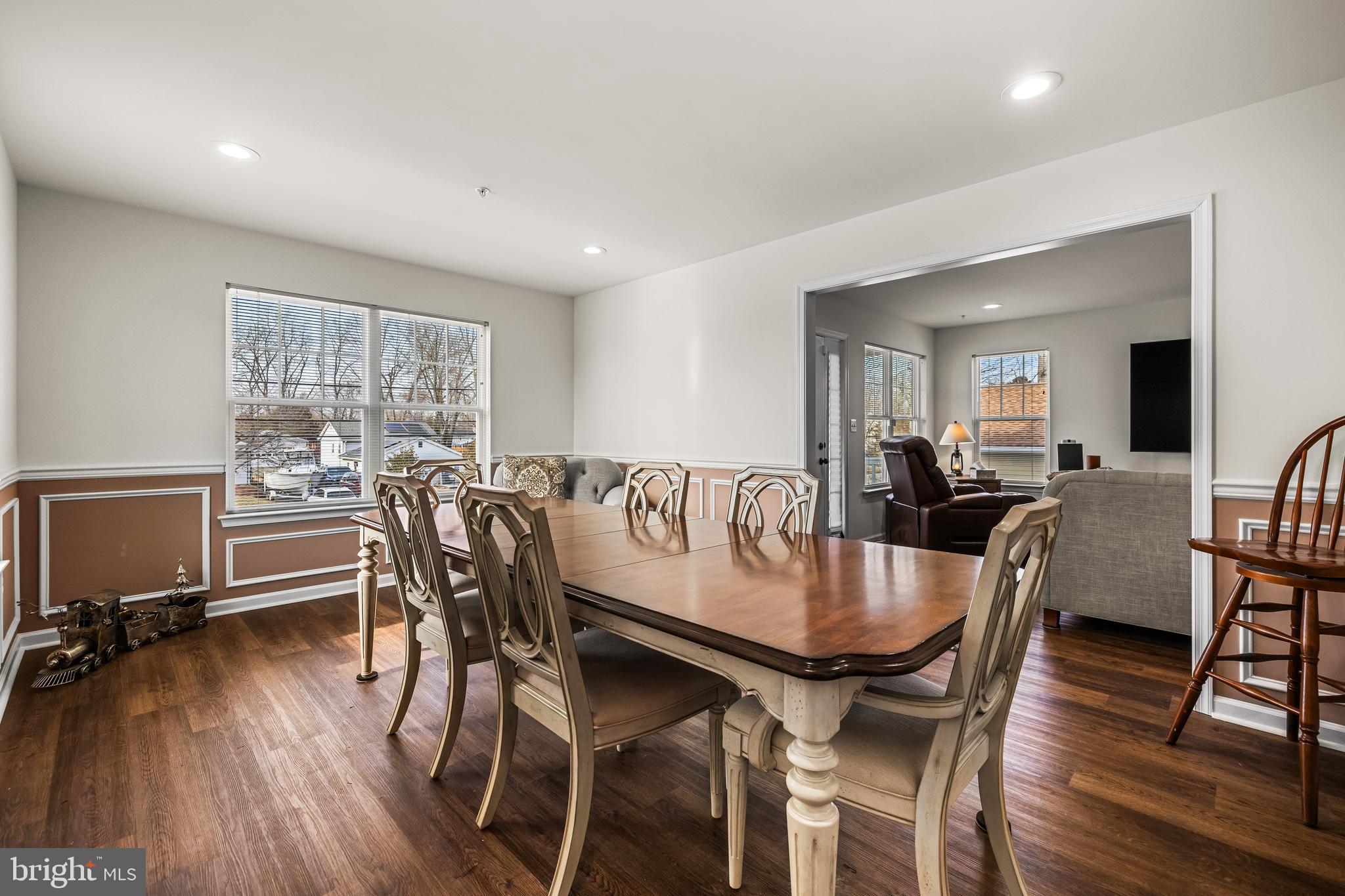 13107 Choptank Road Middle River, MD 21220 - Photo 10 of 42 a view of a dining room with furniture window and wooden floor