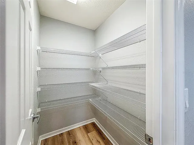 a view of a room with racks on the wall