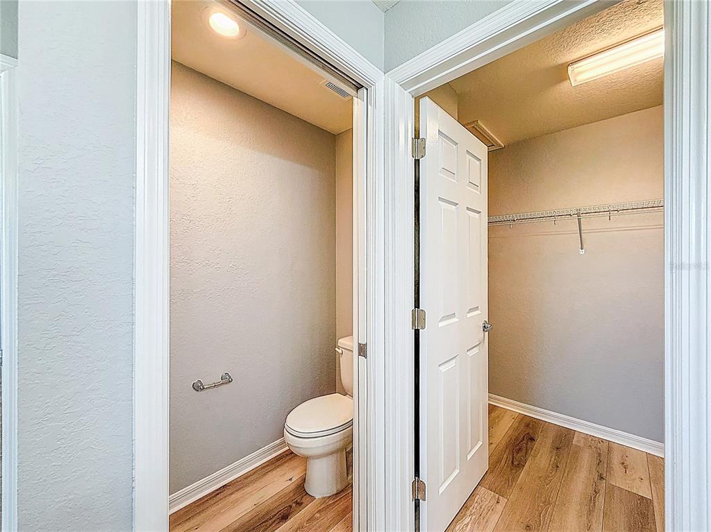 6945 Gideon Circle Zephyrhills, FL 33541 - Photo 37 of 45 a bathroom with a toilet and a shower