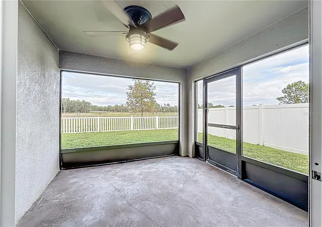 an aerial view of residential houses with outdoor space and swimming pool