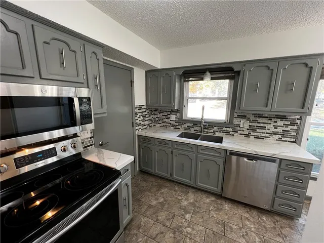 $249,900 | 2106 Southwest Still Meadows Lane, Blue Springs, MO 64015