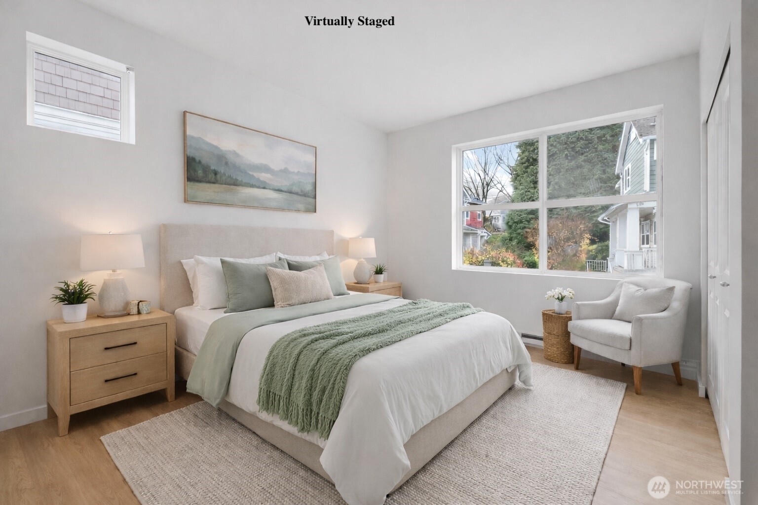 2840 Southwest Raymond Street, Unit 203 Seattle, WA 98126 - Photo 18 of 39 a bedroom with a bed and a couch