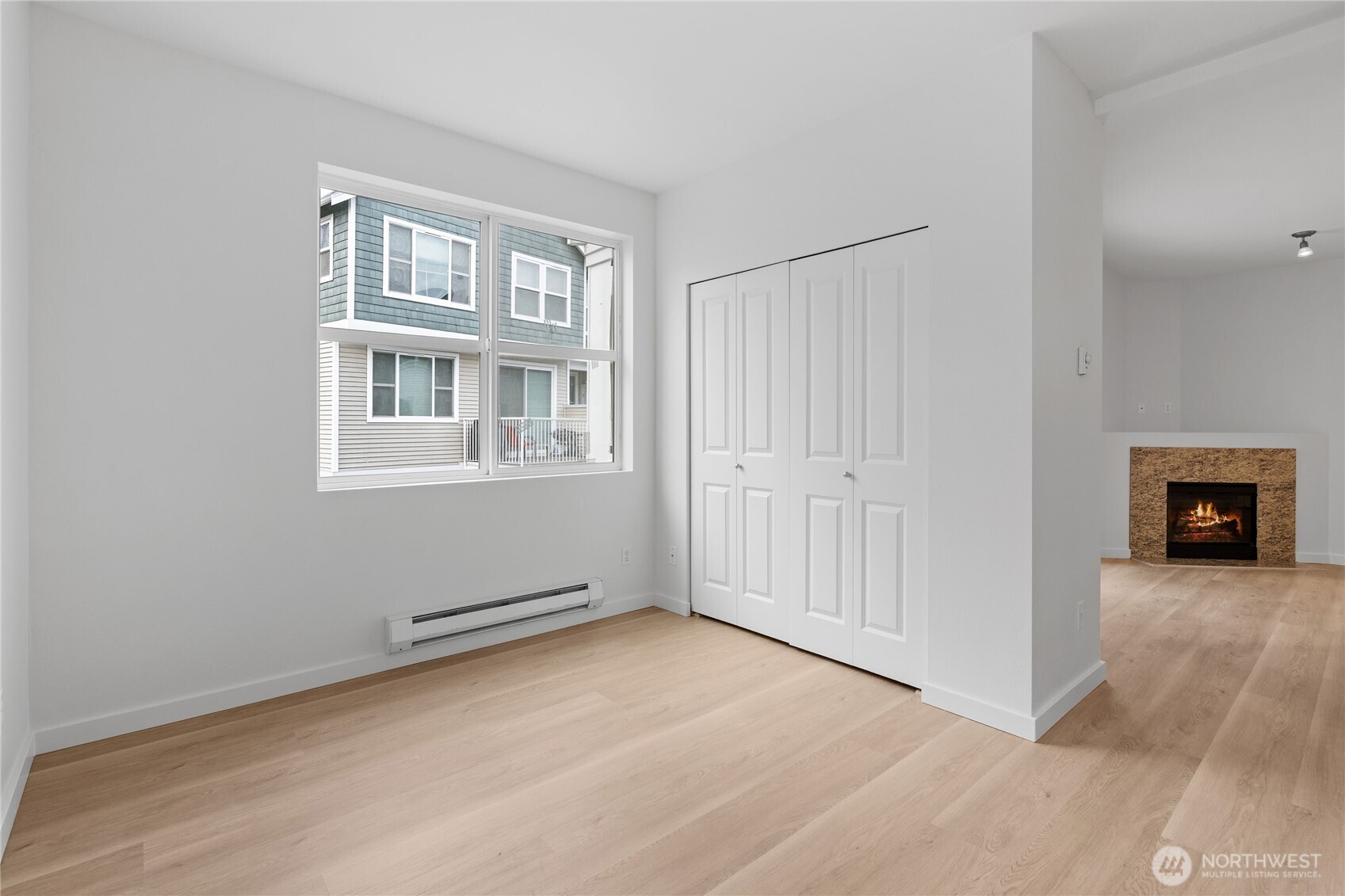 2840 Southwest Raymond Street, Unit 203 Seattle, WA 98126 - Photo 19 of 39 an empty room with windows