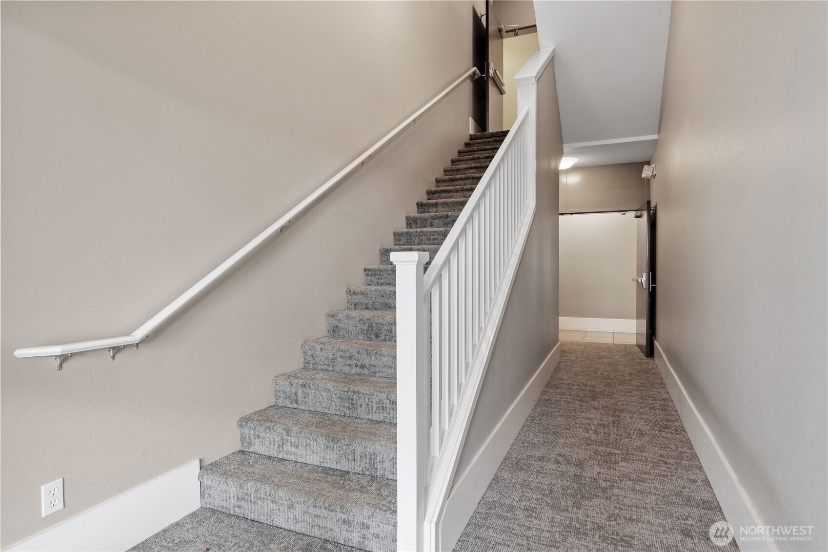 2840 Southwest Raymond Street, Unit 203 Seattle, WA 98126 - Photo 24 of 39 a view of entryway and hall with wooden floor