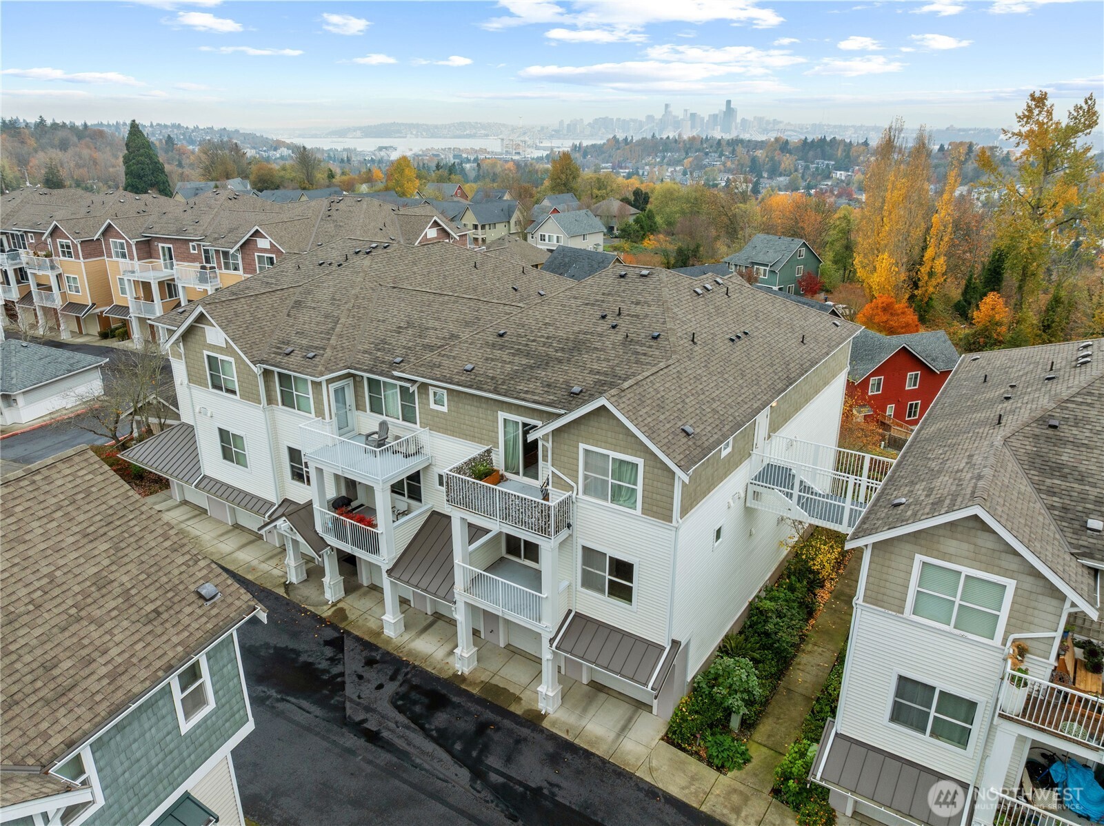 2840 Southwest Raymond Street, Unit 203 Seattle, WA 98126 - Photo 34 of 39 an aerial view of residential houses with outdoor space