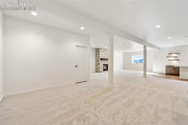 a bathroom with a sink toilet a mirror and shower