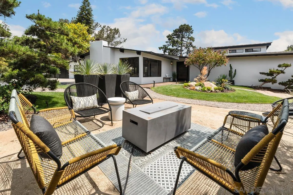465 Glencrest Drive Solana Beach, CA 92075 - Photo 21 of 28 a view of a patio with couches table and chairs and potted plants