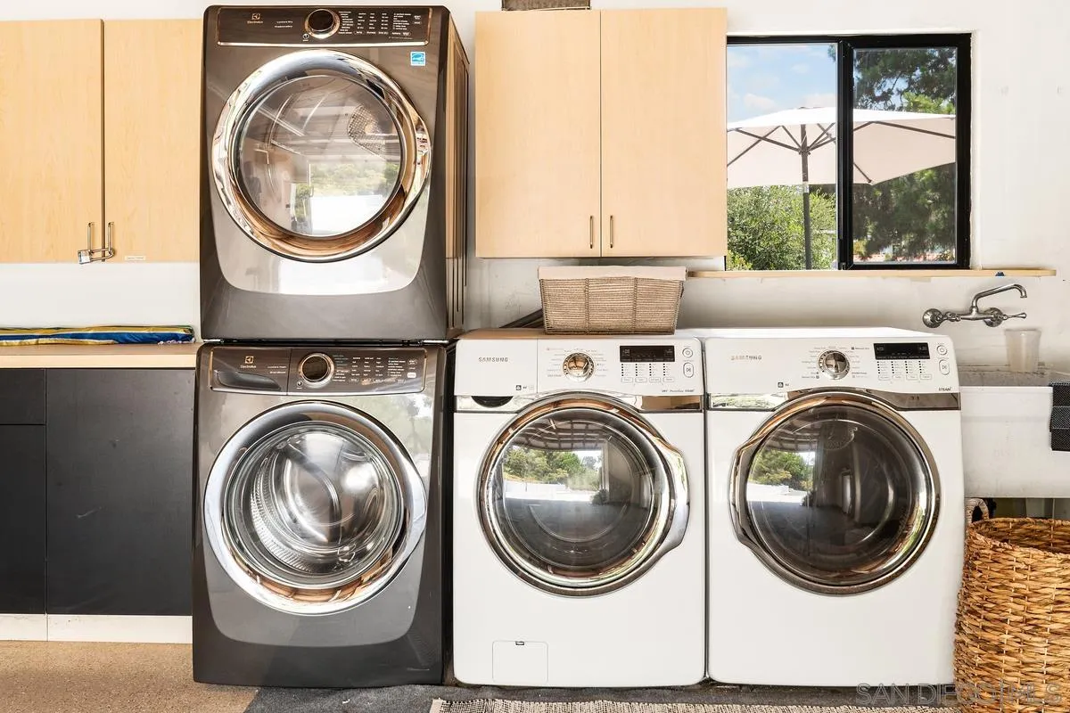 465 Glencrest Drive Solana Beach, CA 92075 - Photo 28 of 28 a utility room with dryer and washer