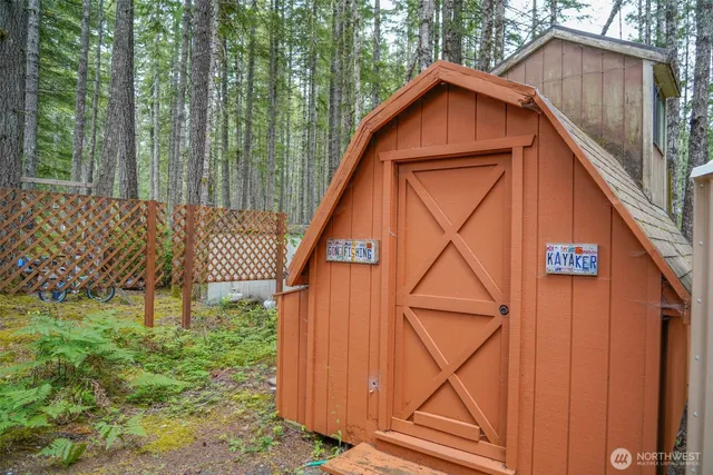 a backyard of a house with seating space