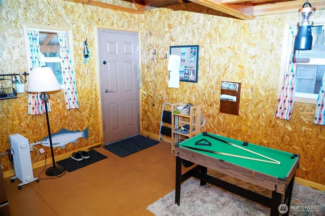 a room with furniture and a rug