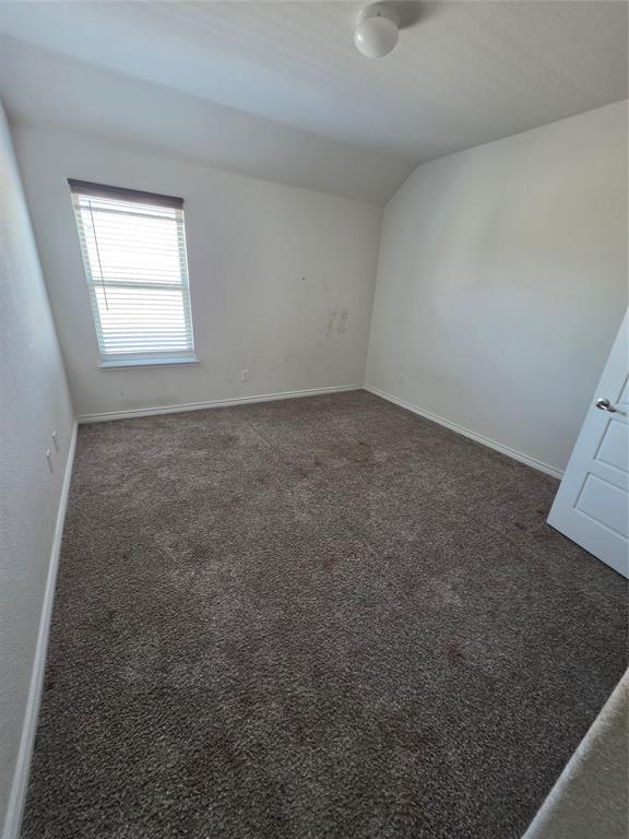 920 Philadelphia Street Fate, TX 75189 - Photo 3 of 8 an empty room with a window