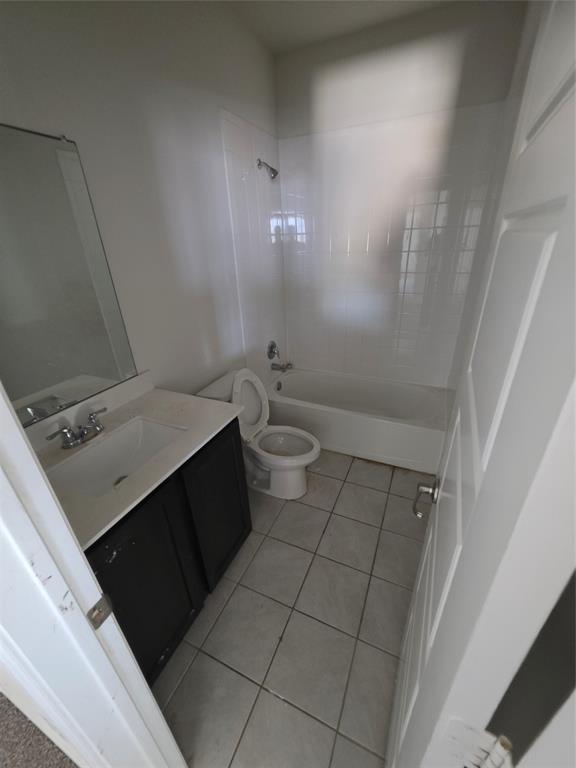 920 Philadelphia Street Fate, TX 75189 - Photo 4 of 8 a bathroom with a sink and a toilet