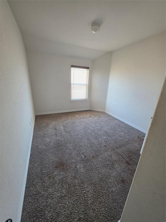 920 Philadelphia Street Fate, TX 75189 - Photo 5 of 8 an empty room with windows