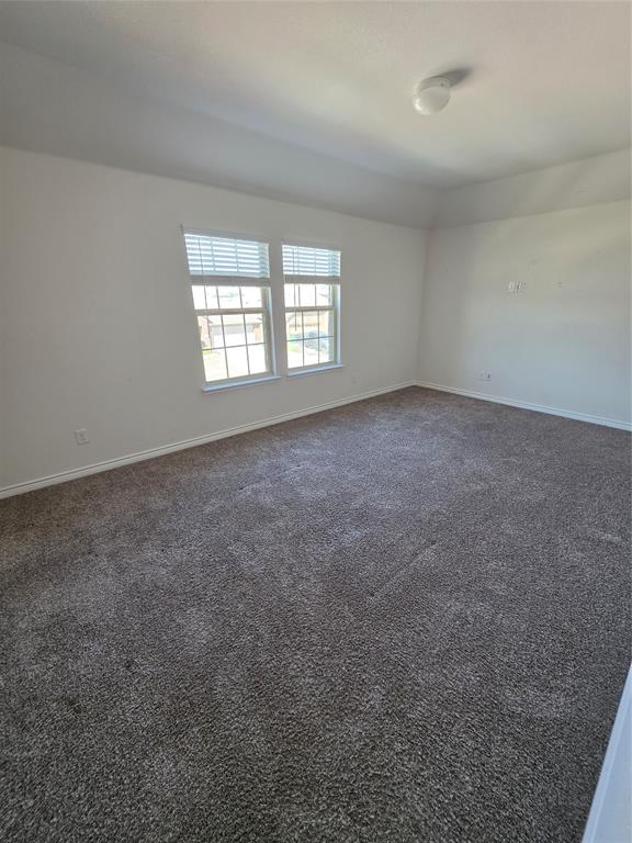 920 Philadelphia Street Fate, TX 75189 - Photo 6 of 8 an empty room with a window