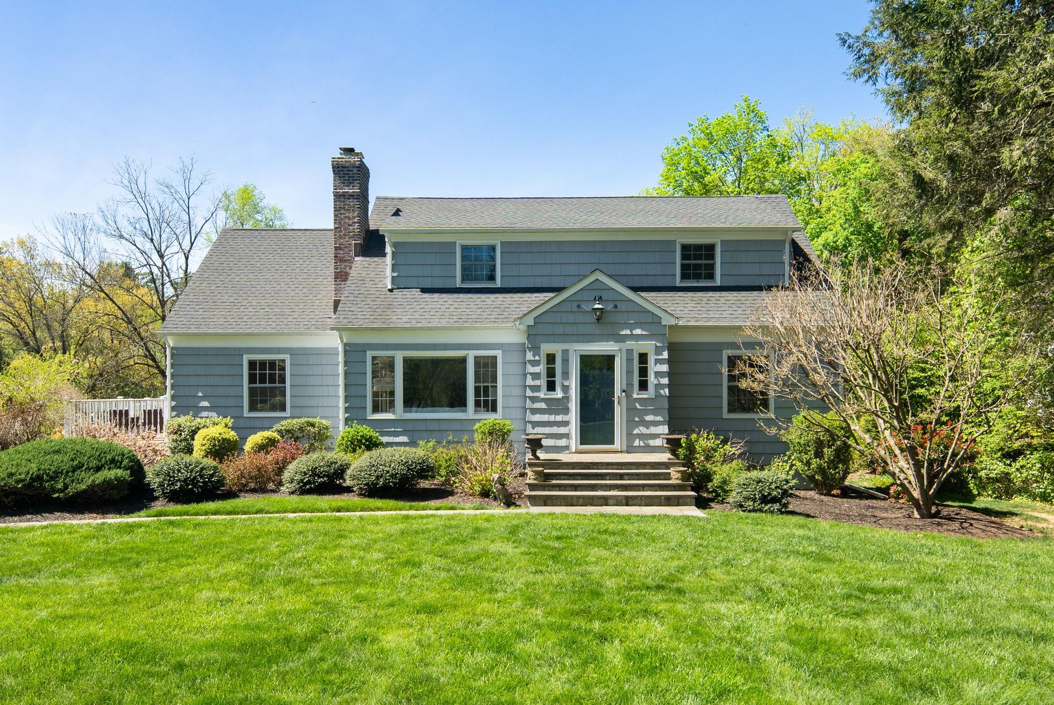 12 Pond Hill Road Chappaqua, NY 10514 - Photo 1 of 30 a front view of house with garden