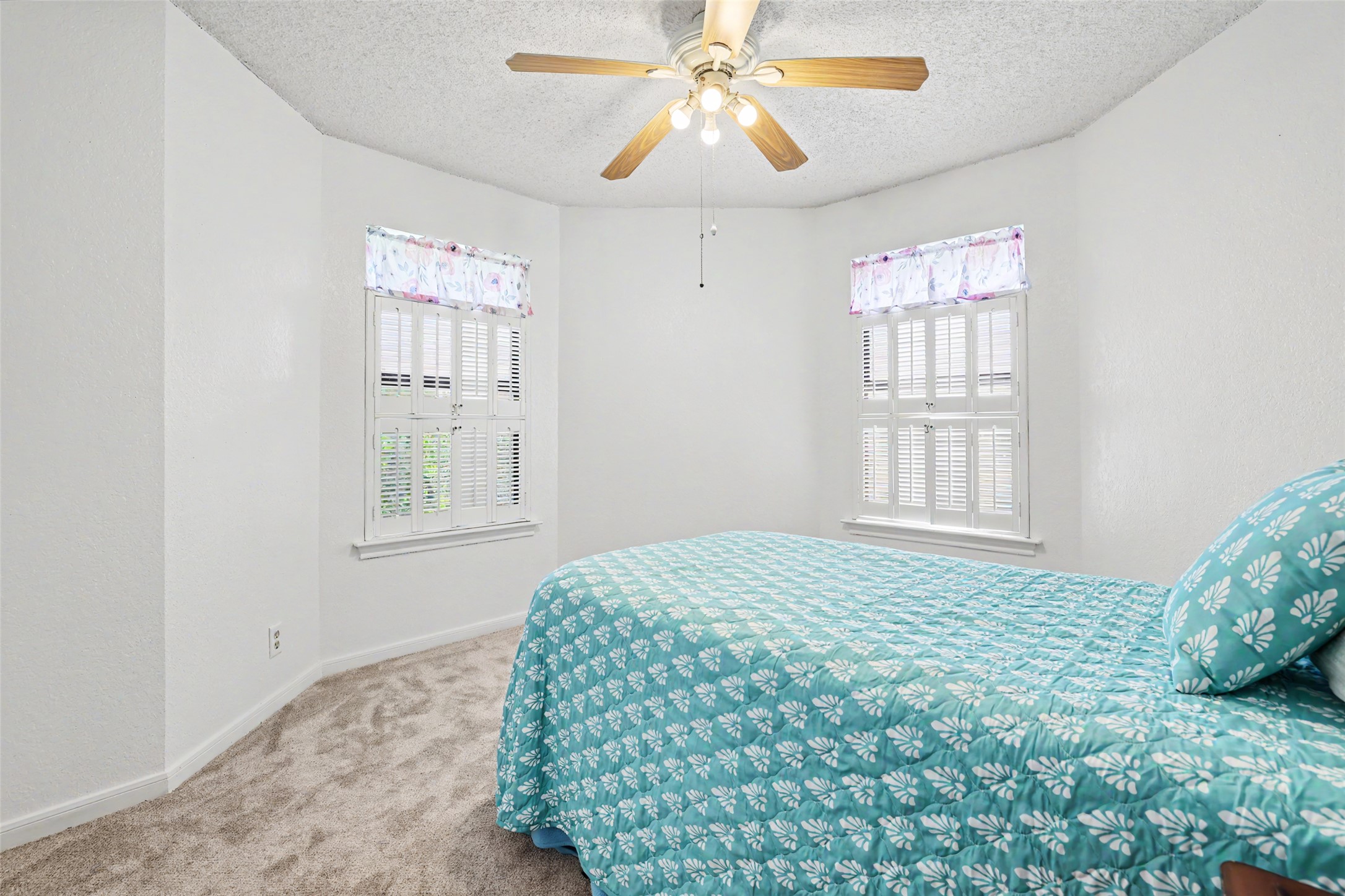 110 South Ridge Circle Georgetown, TX 78628 - Photo 20 of 37 Bright room with bay windows featuring white plantation shutters