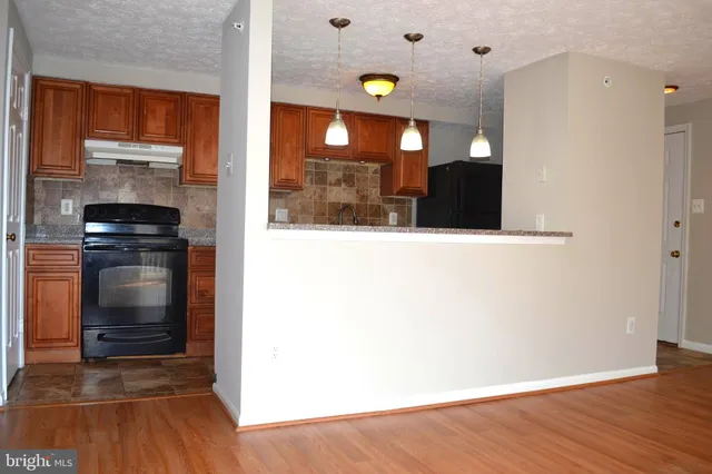 a view of kitchen and utility room